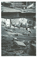 Bulletin cover for summer 2013 - a woman doing laundry amid tin roofs in Guatemala