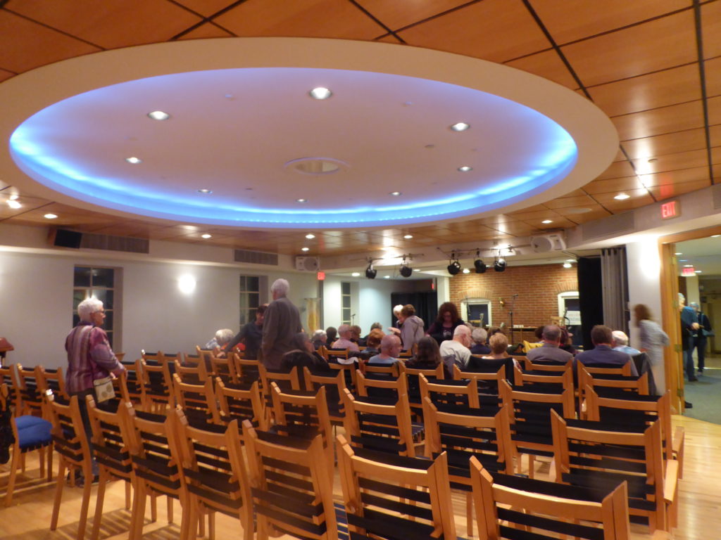 view of main floor looking towards kitchen with movable wall open between sanctuary and skylight room